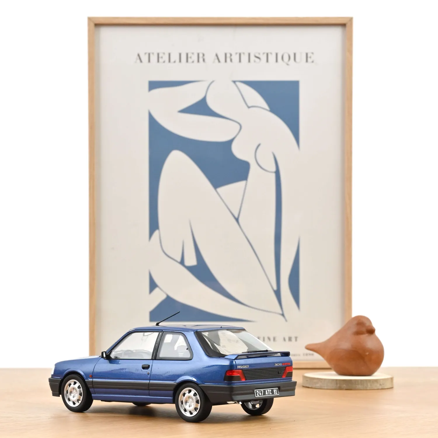 Norev Peugeot 309 GTi 16 1991 Bleu Miami miniature 1/18