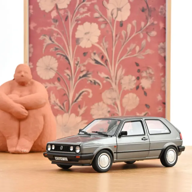 Norev VW Golf Champion 1990 miniature 1/18 grise