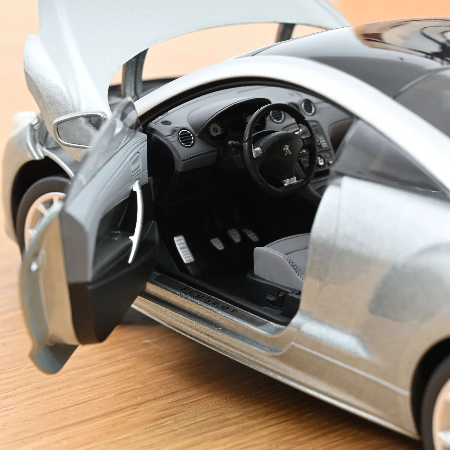 Norev Peugeot RCZ 2010 voiture miniature 1/18 gris Sidobre