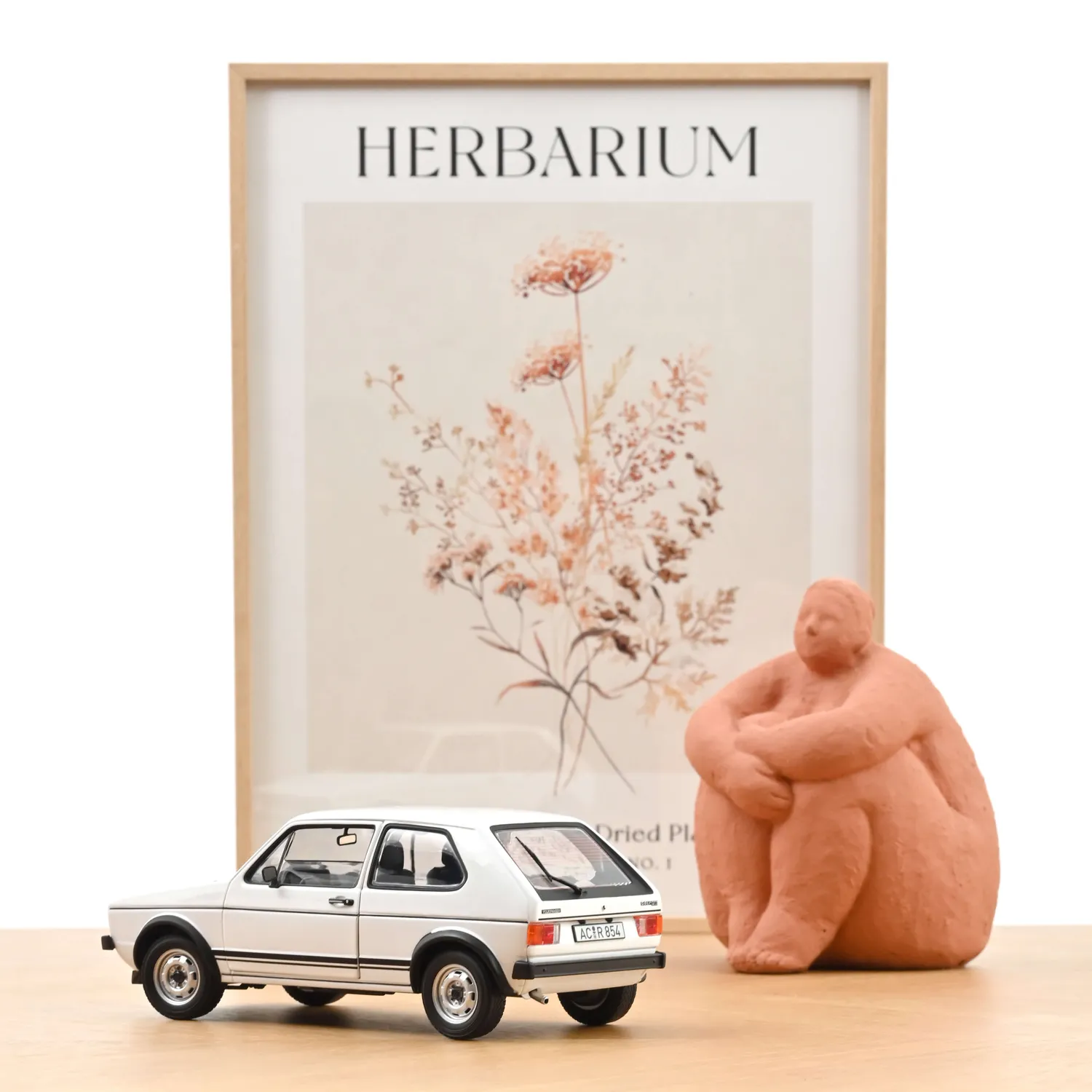 Norev VW Golf GTI 1976 miniature 1/18 blanc alpin