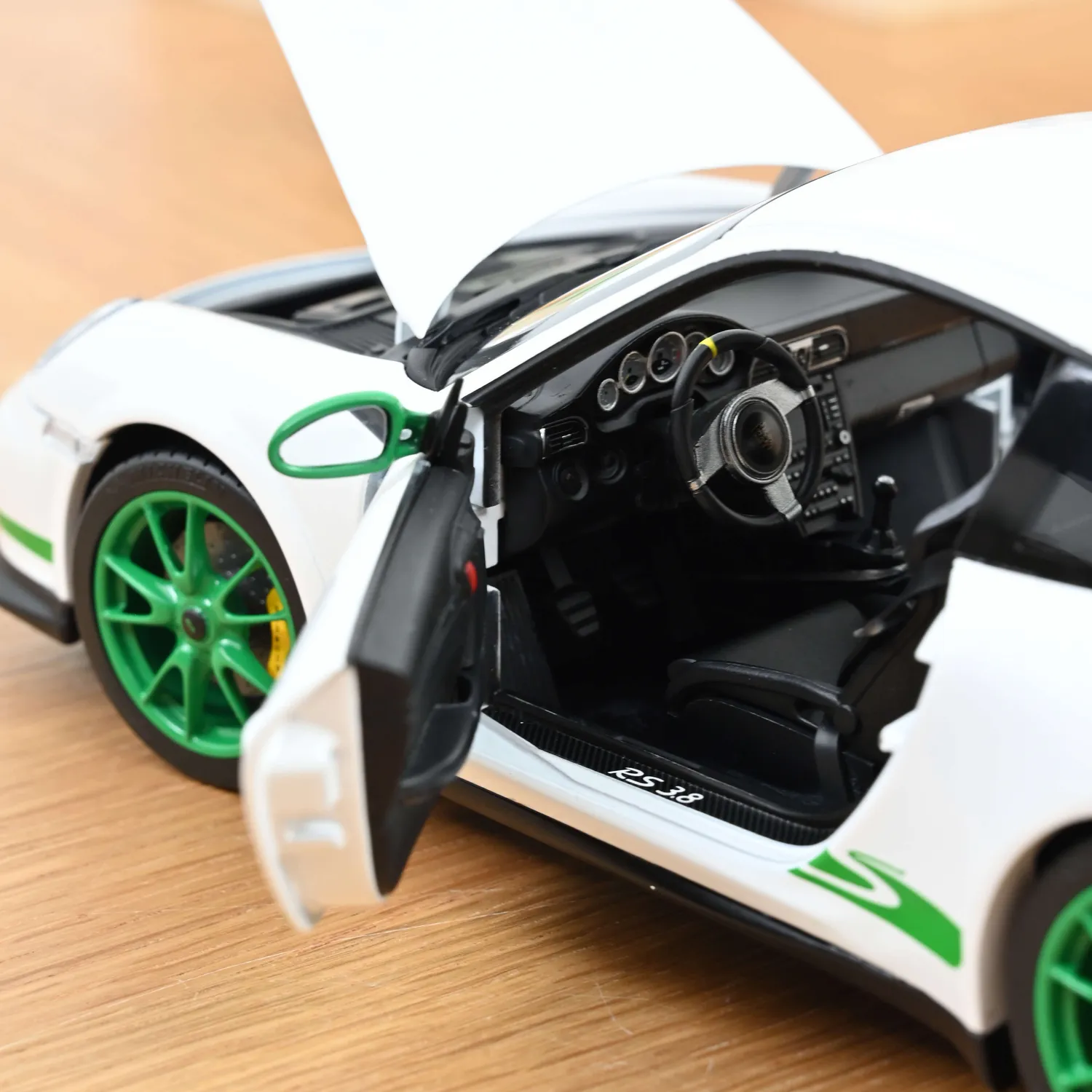 Norev Porsche 911 GT3 RS 2009 miniature 1/18 blanc vert