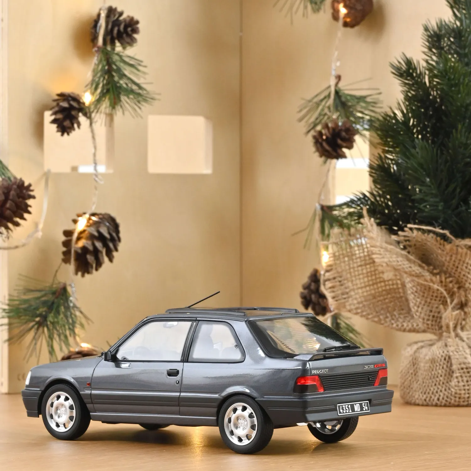 Norev Peugeot 309 GTi 16 1991 miniature 1/18 gris magnum 300 ex