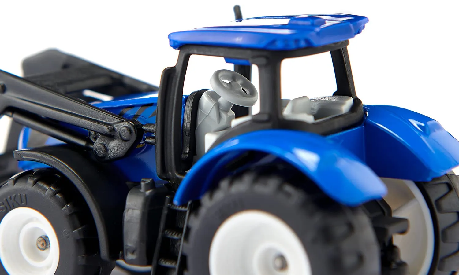 SIKU Super 1544 tracteur New Holland fourche palette bleu
