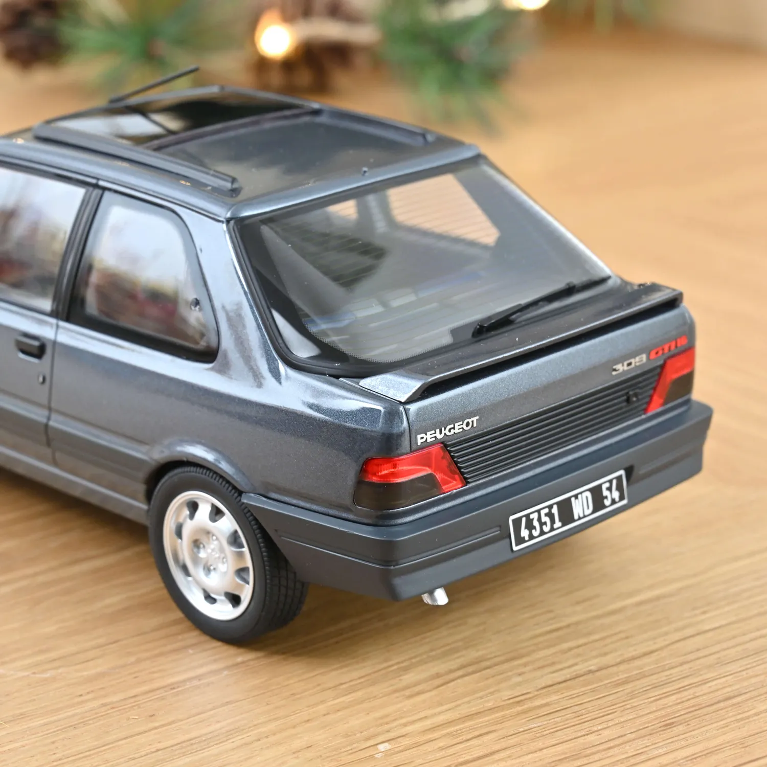 Norev Peugeot 309 GTi 16 1991 miniature 1/18 gris magnum 300 ex