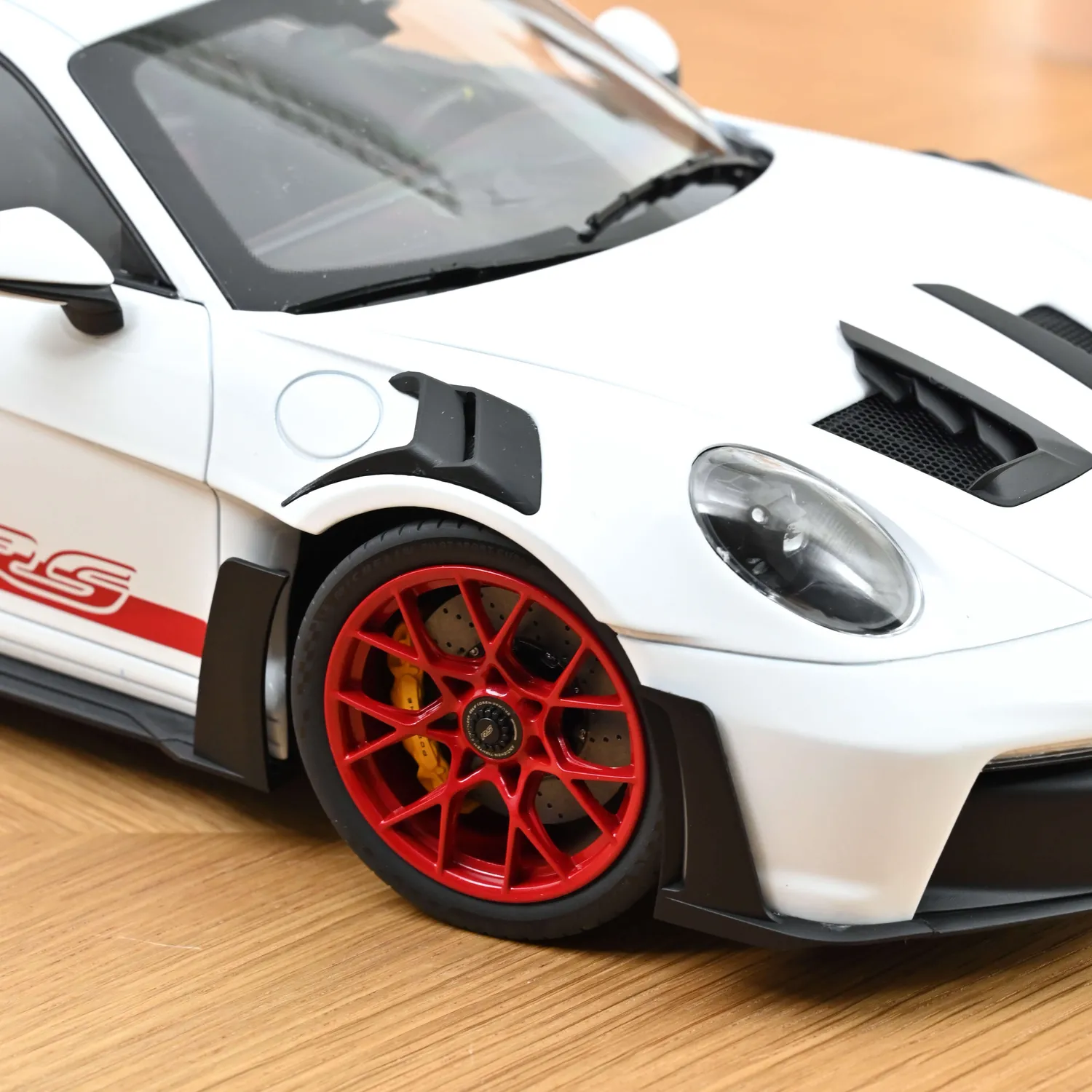 Norev Porsche 911 GT3 RS 2022 miniature 1/12 blanc pyro