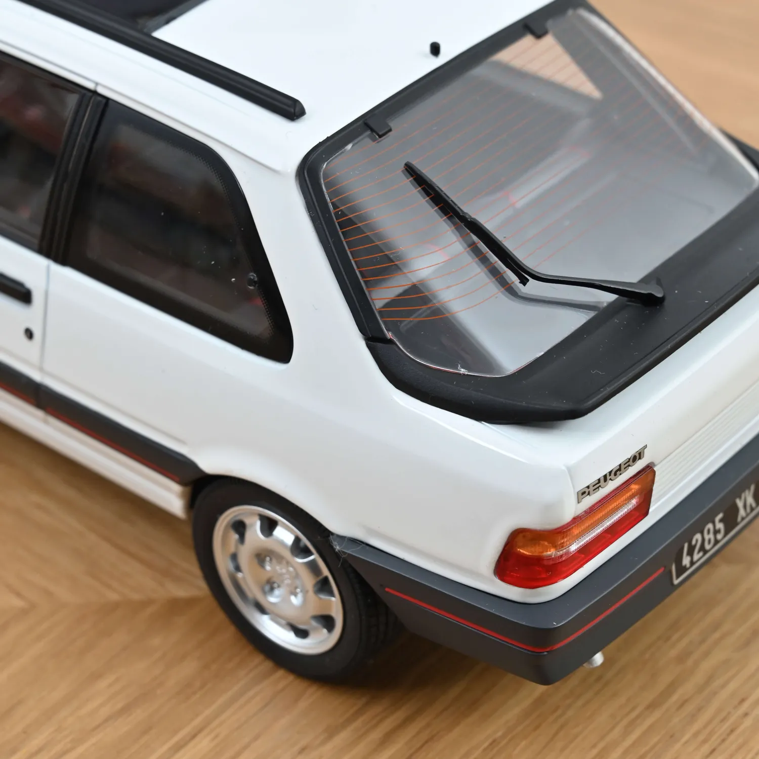 Norev Peugeot 309 GTi 1987 miniature 1/18 blanc Meije