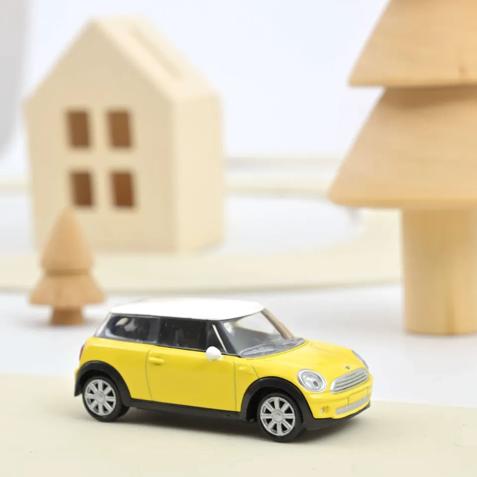 Norev Mini Cooper One miniature 1/54 jaune pâle