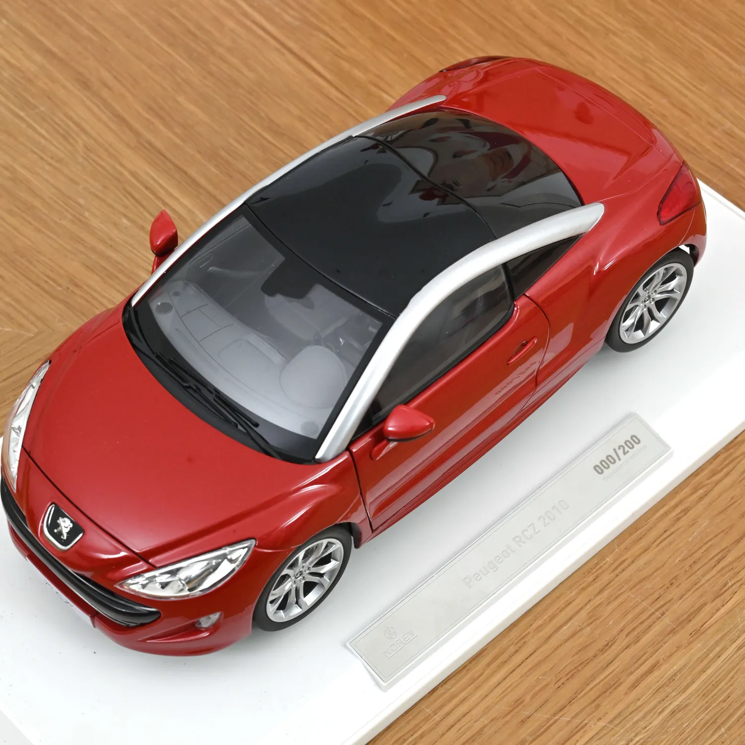 Norev Peugeot RCZ 2010 miniature 1/18 rouge tourmaline 200 pcs