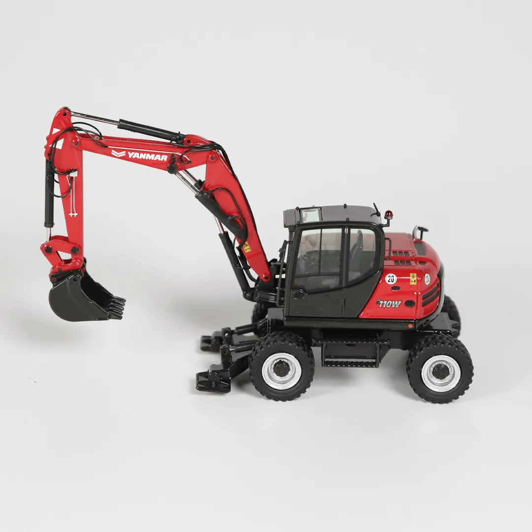 NZG Yanmar B110W pelle sur pneus miniature 1:50
