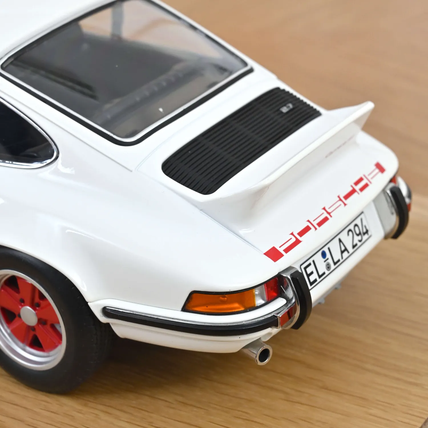 Norev Porsche 911 Carrera RS 2.7 miniature 1/12 blanc rouge
