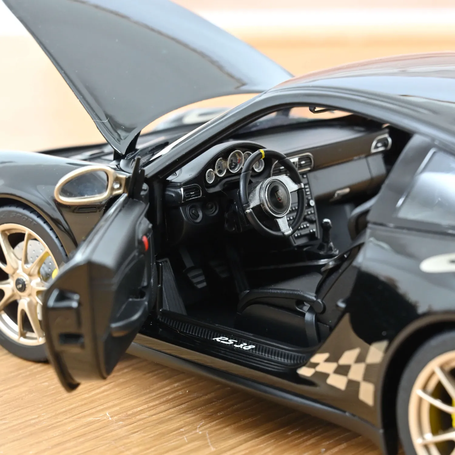 Norev Porsche 911 GT3 RS 2009 miniature 1/18 noir